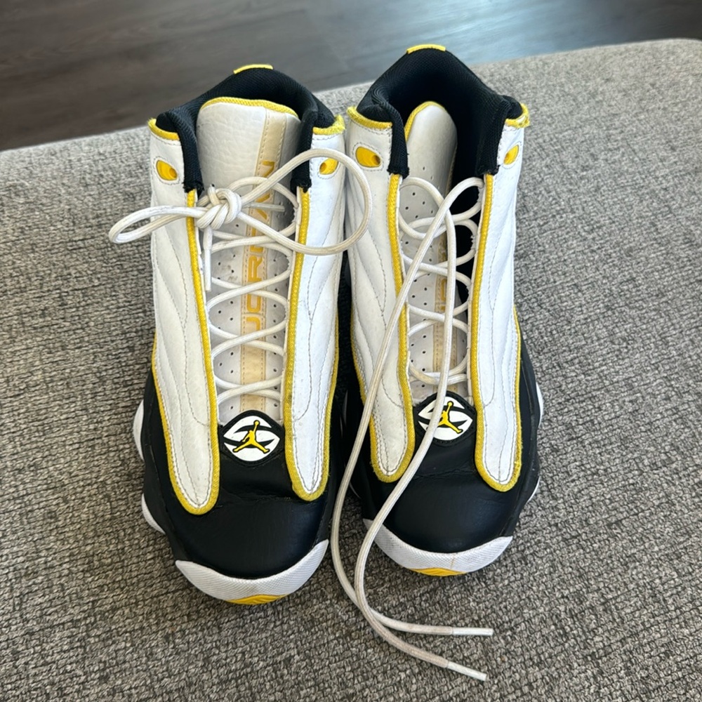 Yellow black and white Jordan’s